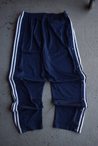 Vintage Adidas Classic Logo Embroidered Snap Track Pants (XL) - Retrospective Store