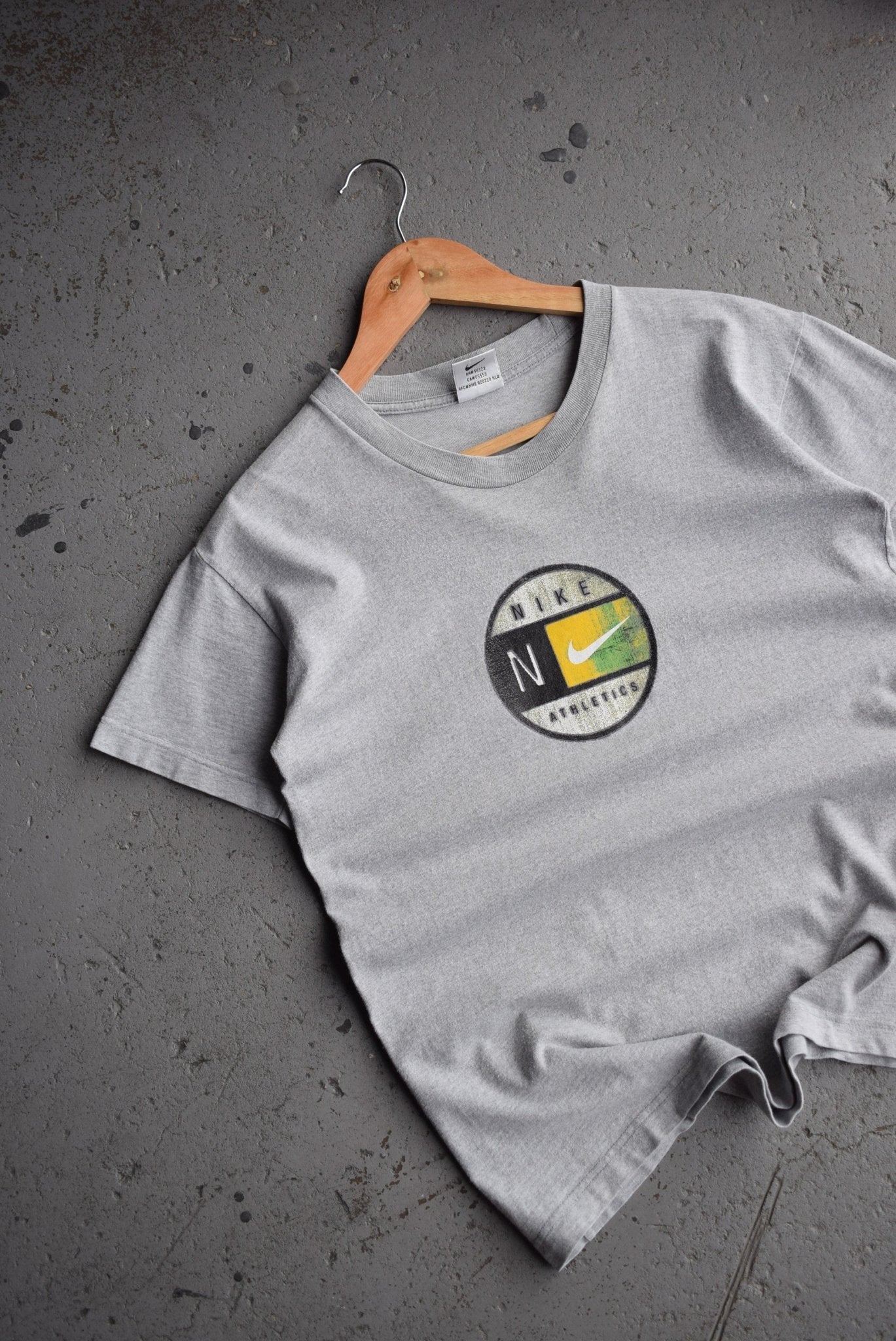 Vintage Nike Athletics Tee (Women's M) - Retrospective Store