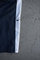Vintage Nike Classic Logo Embroidered Track Pants (L) - Retrospective Store