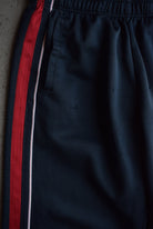 Vintage Nike Classic Logo Embroidered Track Pants (M) - Retrospective Store