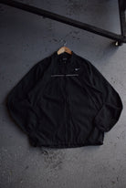 Vintage Nike Classic Logo Embroidered Windbreaker Jacket (L) - Retrospective Store
