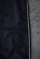 Vintage Nike Court Classic Logo Embroidered Track Pants (L/XL) - Retrospective Store