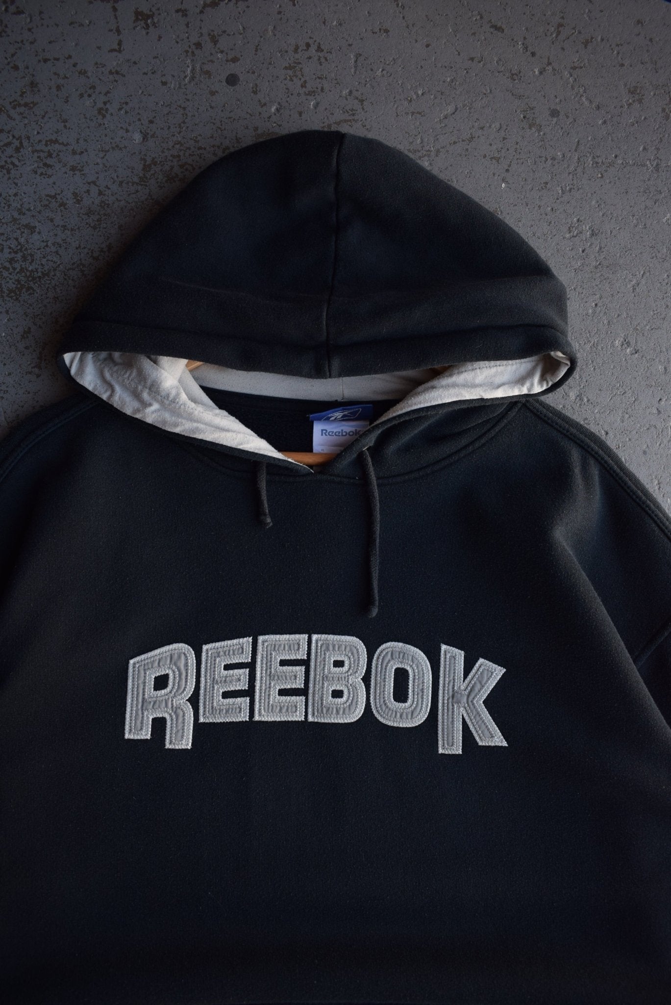 Vintage Reebok Embroidered Spellout Hoodie (XL) - Retrospective Store