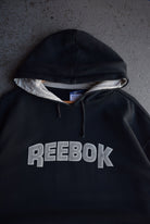 Vintage Reebok Embroidered Spellout Hoodie (XL) - Retrospective Store